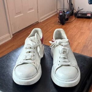 White Sneakers with Red Accents